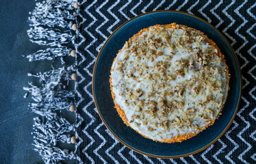 Delicious carrot cake on minimalist abstract geometric background