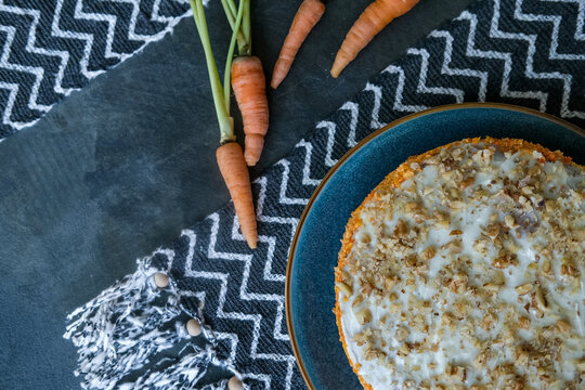 Delicious Carrot Cake With Ingredients On Abstract Geometric Minimalist Background