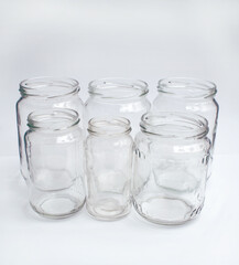 Empty clear jars, recycled and reusable glass containers 