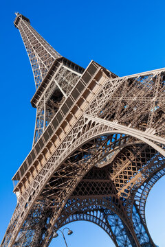 The Eiffel Tower at the Champ De Mars in Paris France built in 1889 which is a popular travel destination tourist attraction landmark of the city, stock photo image