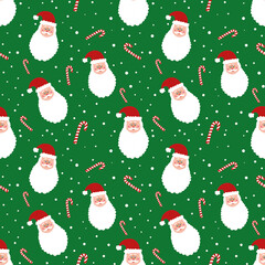 Seamless pattern with Santa Claus head and candy cane on green background . Christmas background. snowy design. wrapping paper. New year wallpaper