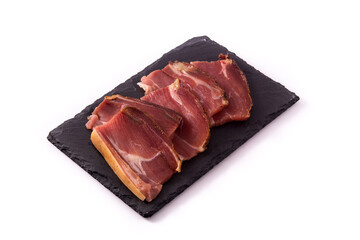 Dried and smoked meat slice isolated on white background	