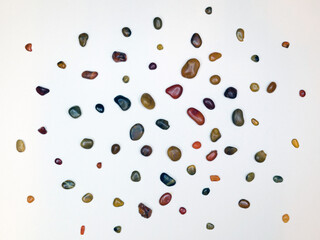 A group of dark and light, large and small carnelians.