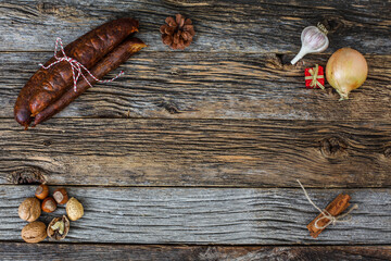 Rusticl table top view with home made sausages and other decor