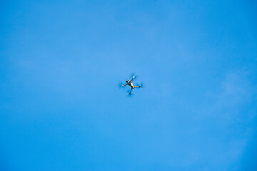 Naklejka na ściany i meble drone fly in blue sky