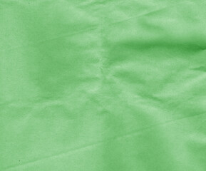 green craft paper with wrinckles surface.