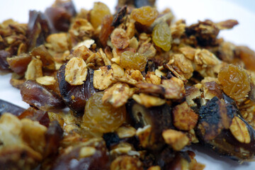 Tasty granola on white with blur effect.