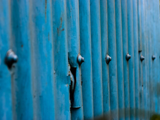 A wall made of Corrugated Galvanized Iron (GCI) sheet and nuts(edited)