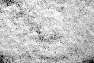 White snow texture with blur effect in black and white.
