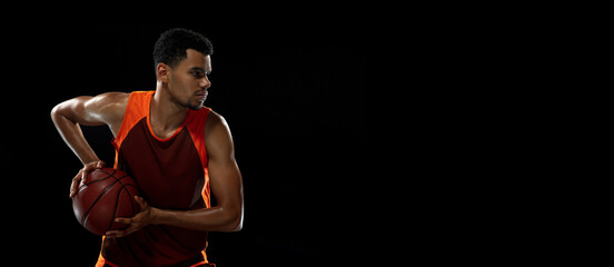 Speed. Young purposeful african-amrican basketball player training, practicing in action, motion...