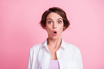 Photo portrait of shocked impressed young woman wearing fashion white outfit staring opened mouth isolated on pink pastel color background