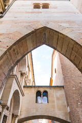 Arch of Ghirlandina Tower. Metropolitan Cathedral of Saint Mary of the Assumption and Saint Geminianus. Modena, Italy