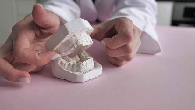 Extreme close up of dental plaster cast on the desk