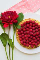 bright raspberry cake on a plate