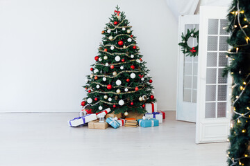 Christmas tree with gifts decor garland interior new year