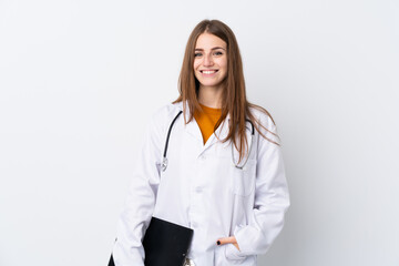 Young woman over isolated background wearing a doctor gown and holding a folder