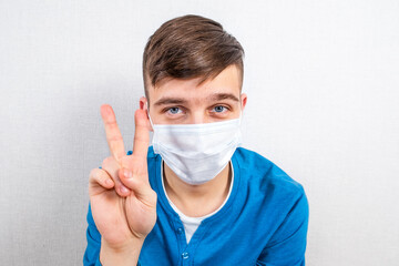 Young Man in Flu Mask