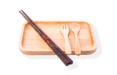 Wooden chopsticks and plate placed on a white background.