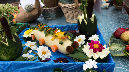 A composition on the table and fairy-tale characters of fruits and vegetables lie on the table at...