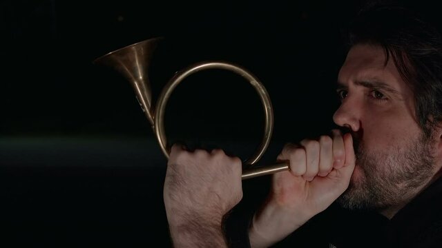 Man Blowing Trumpet Concept