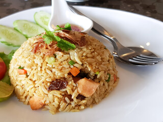 Delicious fried rice on white plate background