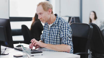 Man using computer in office