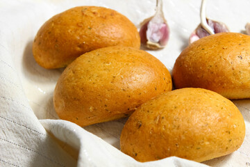 Homemade rosy buns with spices for soup.