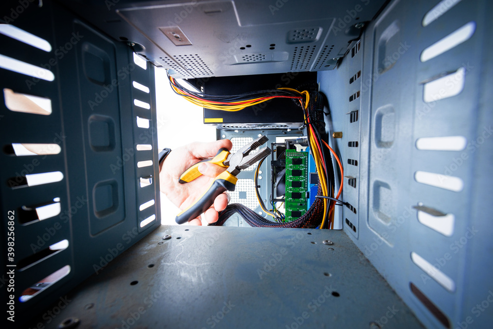 Poster technician worker repair and adjusting desktop pc hardware equipment. man using tools for repair com