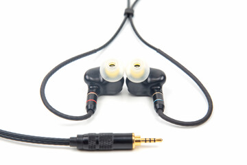 In-ear headphones for Hi-Fi music player. Audio sound and modern equipment for music lovers and...