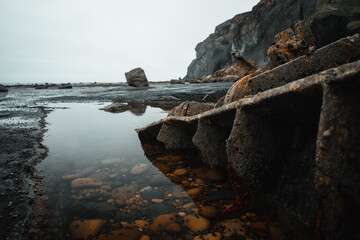 Rusted shipwreck along the coast