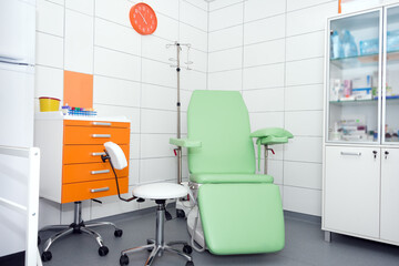 Modern and comfortable equipped hospital room. Treatment room with medicine in the fridge.
