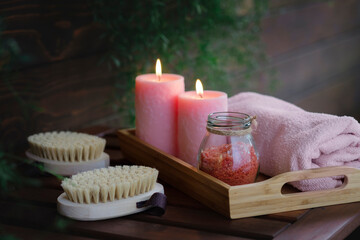 Dry massage brushes, towel, bath salts and candles. Cosmetic treatment for beauty. Natural aromatherapy. Healthy bath, body care, health care, wellness. Nature for body, relax. SPA.