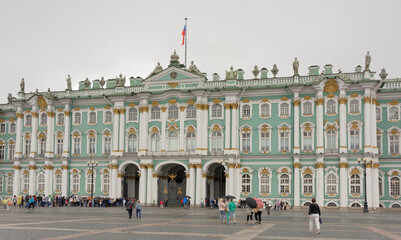 Tourists at the Palace Square in the rain