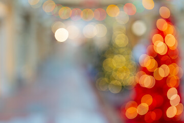 Beautiful bokeh effect. Blurred bright festive Christmas background.