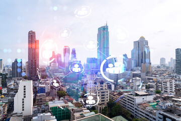 Fototapeta premium Social media icons hologram over panorama city view of Bangkok, Asia. The concept of people networking and connections. Double exposure.