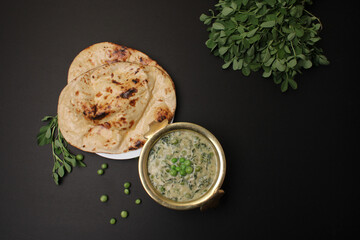 Methi Mutter Malai, Indian food server with naan or tandoori roti.