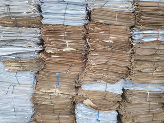 Stacks of tied waste paper for disposal.