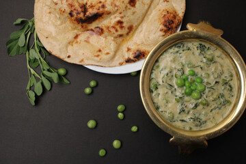 Methi Mutter Malai, Indian food server with naan or tandoori roti.