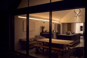 Exterior View Of Beautiful Kitchen Extension At Night