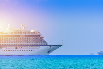 side boat of Cruise ship forward sailing in seawater blue.