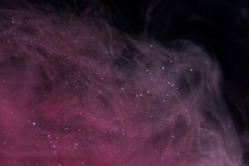 Abstract color paint splash isolated on black background