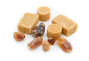 brown sugar and raw cubes isolated on white background