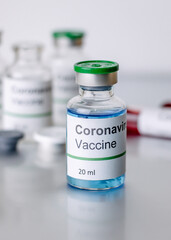  coronavirus covid-19 vaccine in vaccine bottle, doctor in the laboratory with a biological tube for analysis and sampling of Covid-19 infectious ,covid concept