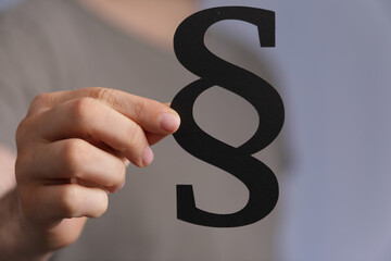 paragraph law sign digital in hand black.