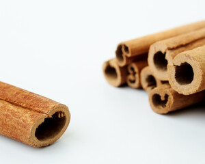 Cinnamon close up on a white background