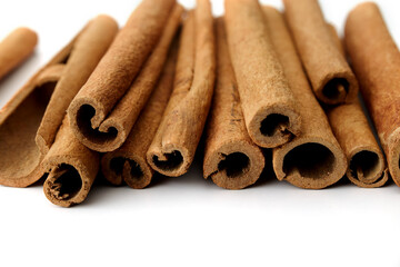 Cinnamon close up on a white background