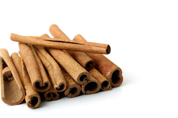 Cinnamon close up on a white background
