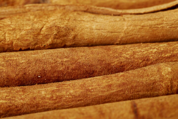 Cinnamon close up on a white background