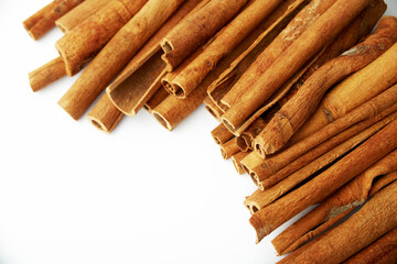Cinnamon close up on a white background