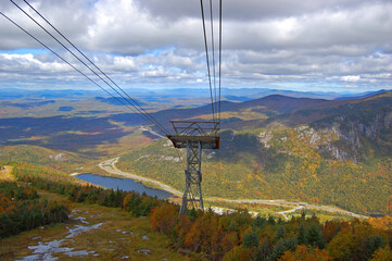 Franconia Notch with fall foliage and Echo Lake aerial view from Cannon Mountain Tramway in Franconia Notch State Park in White Mountain National Forest, near Lincoln, New Hampshire NH, USA. 